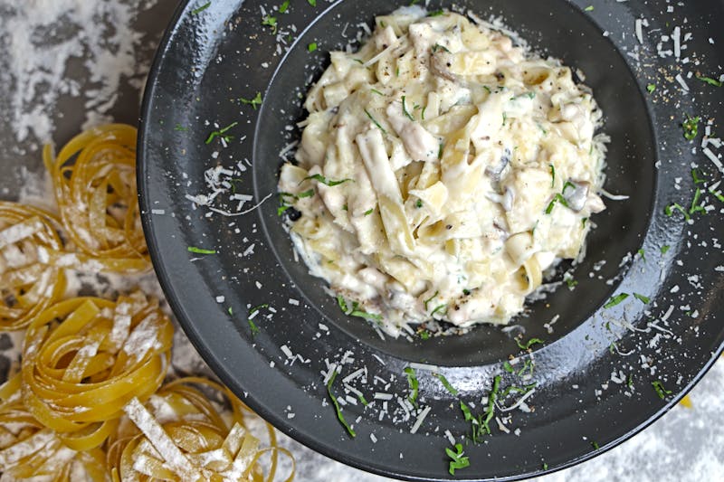 Creamy fettuccine Alfredo with parmesan cheese