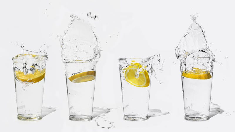 Italian sparkling water in glass with lemon